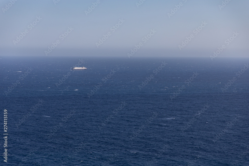 Big cruiser boat far on the horizon Big cruiser boat far on the horizon