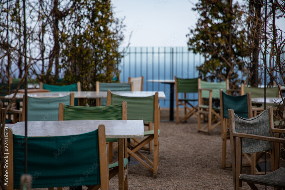 Fototapeta premium Summer restaurant terrace on shore with sea views