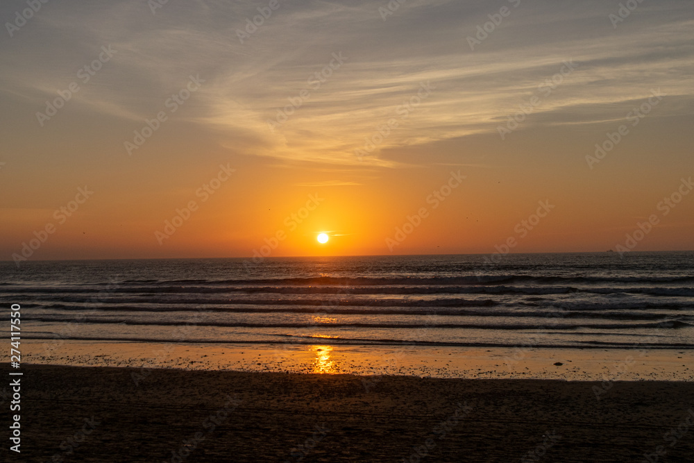 Sunset twilight over the Atlantic Ocean from Agadir Beach, Morocco