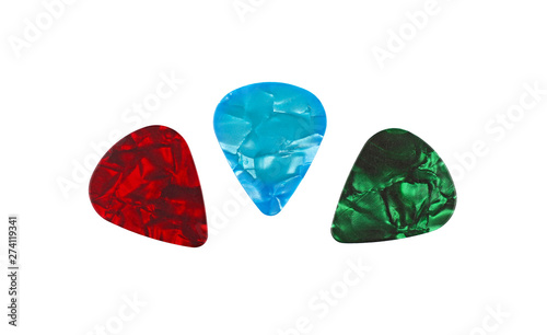 Three colorful guitar picks isolated on white photo