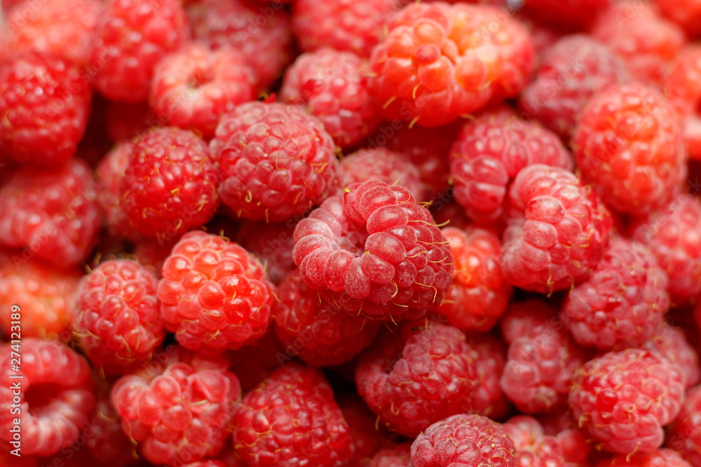 Heap of sweet red raspberries close up for bckground Heap of sweet red raspberries close up for bckground