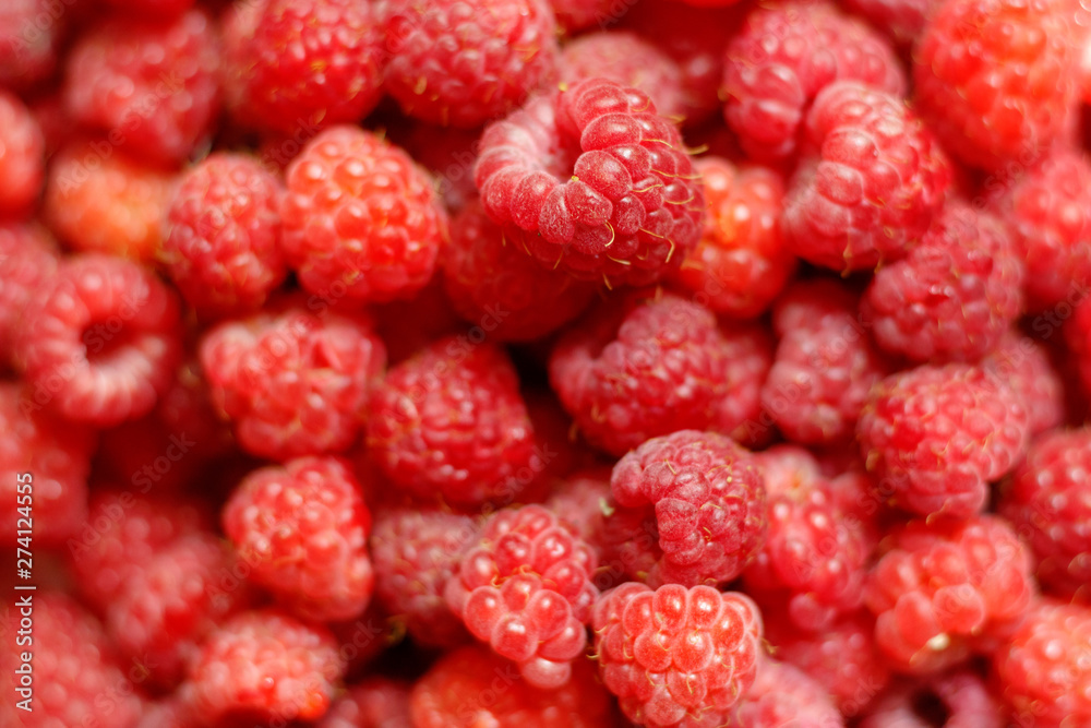 Heap of sweet red raspberries close up for background Heap of sweet red raspberries close up for background