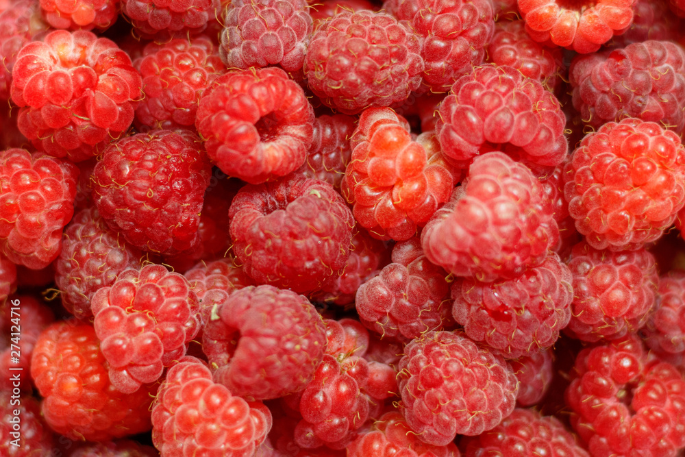 Heap of sweet red raspberries close up for background Heap of sweet red raspberries close up for background