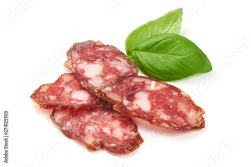 Dried pork sausage slices, Italian smoked meat, close-up, isolated on white background
