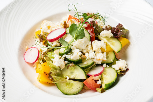 vegetable salad on the white plate