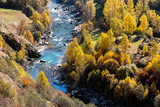 Engadine valley with the Inn river in a seasonal fall landscape