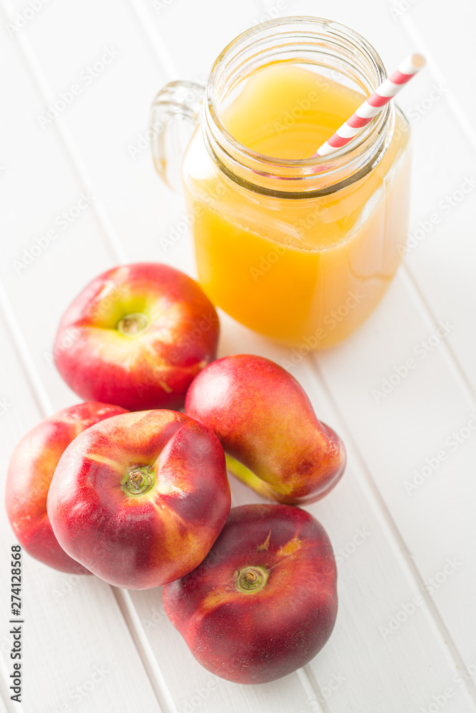 Ripe flat nectarines. Ripe flat nectarines.