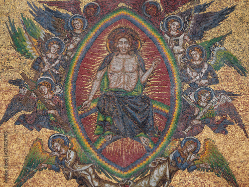 Jesus Surrounded with Angels Detail of the Mosaic of the Last Judgment at the Golden Gate of the Gothic Church Saint Vitus Cathedral in Prague, Bohemia, Czech Republic. A Famous Tourist Attraction.