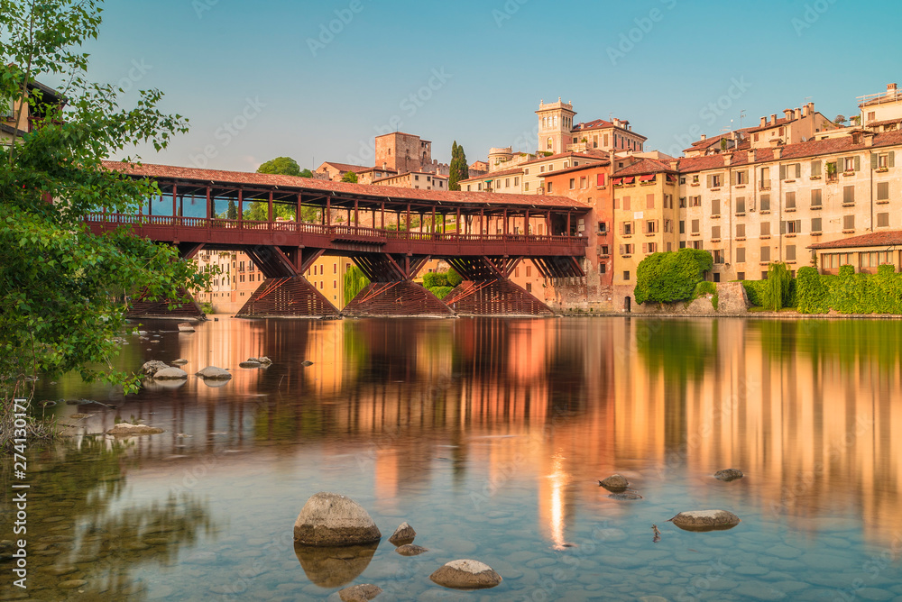Bassano del Grappa before  the sunset and city reflections in the Brenta River