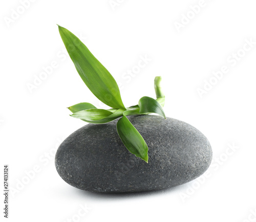Spa stone with bamboo isolated on white