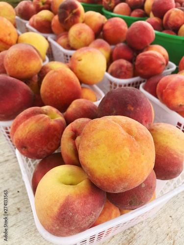 Fresh Georgia Peaches for Sale at a Farmers Market