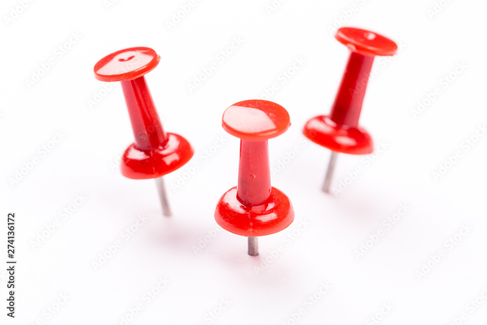 Push red pins isolated on white background. Push red pins isolated on white background.