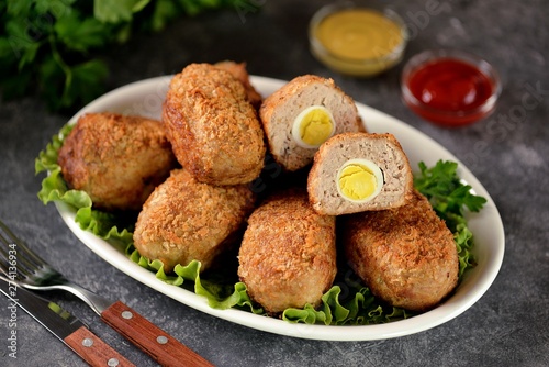Fried meat balls with boiled quail egg inside.