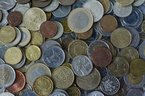 Scattered coins of different countries