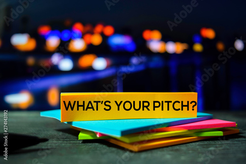 What's Your Pitch? on the sticky notes with bokeh background