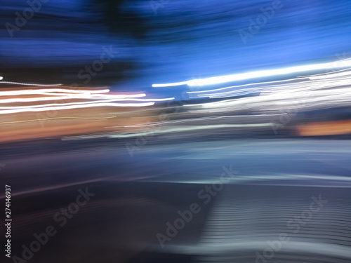 Abstract background with blue and white lines in motion and blurred effect