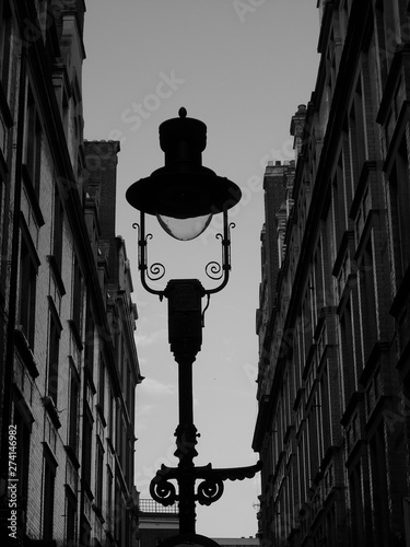 street lamp in front of old building