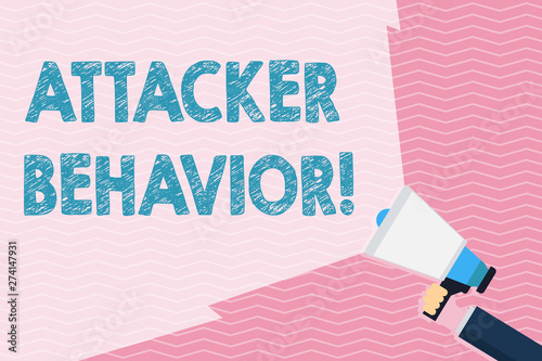 Writing note showing Attacker Behavior. Business concept for analyze and predict the attacker behavior of the attack Hand Holding Megaphone with Beam Extending the Volume Range