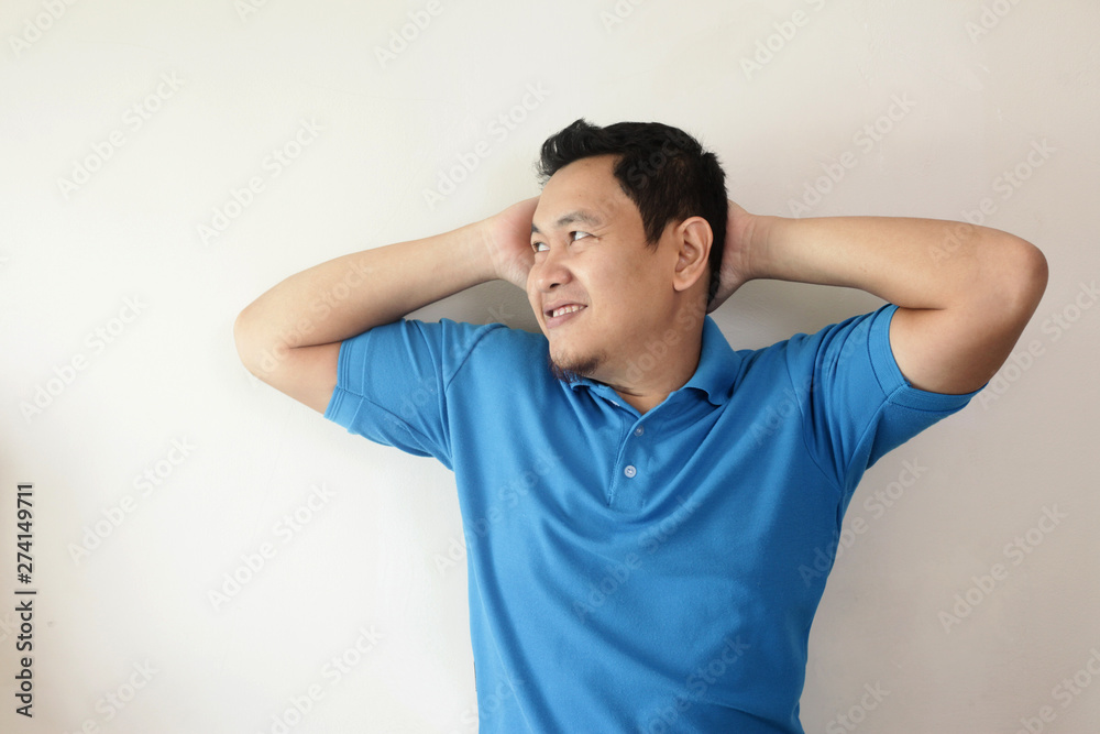 Young Man Thinking and Looking Up, Having Good Idea Young Man Thinking and Looking Up, Having Good Idea