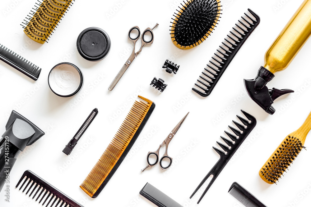 Set of professional hairdresser tools with combs and styling on white background top view pattern Set of professional hairdresser tools with combs and styling on white background top view pattern