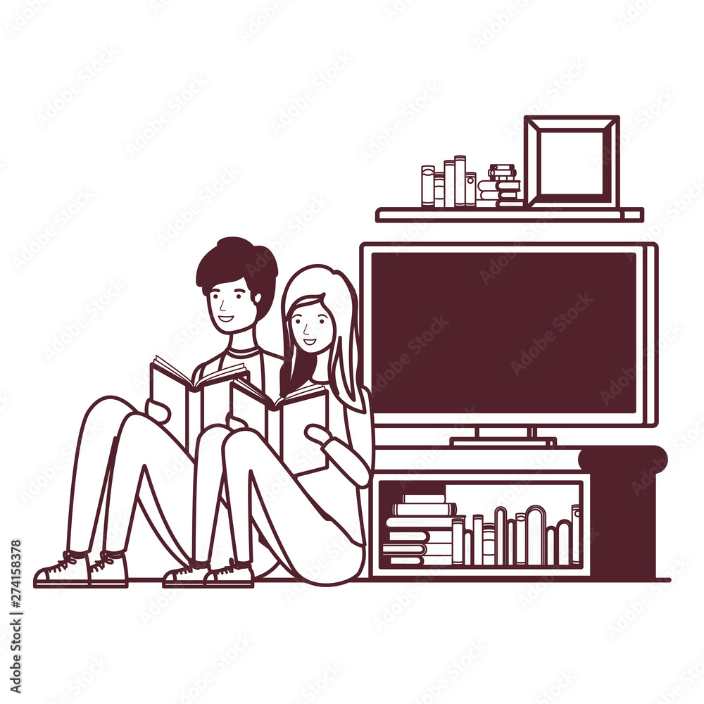 silhouette of couple with book in hands in living room silhouette of couple with book in hands in living room