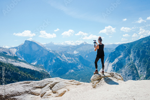 Vlogger on a mountain top