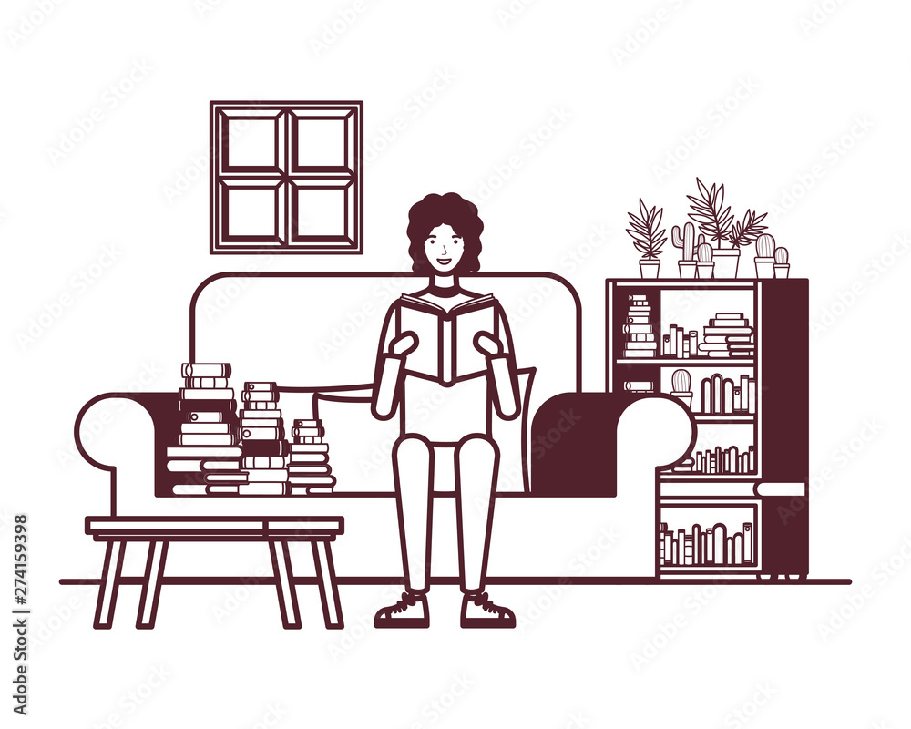 silhouette of man with book in hands in living room silhouette of man with book in hands in living room