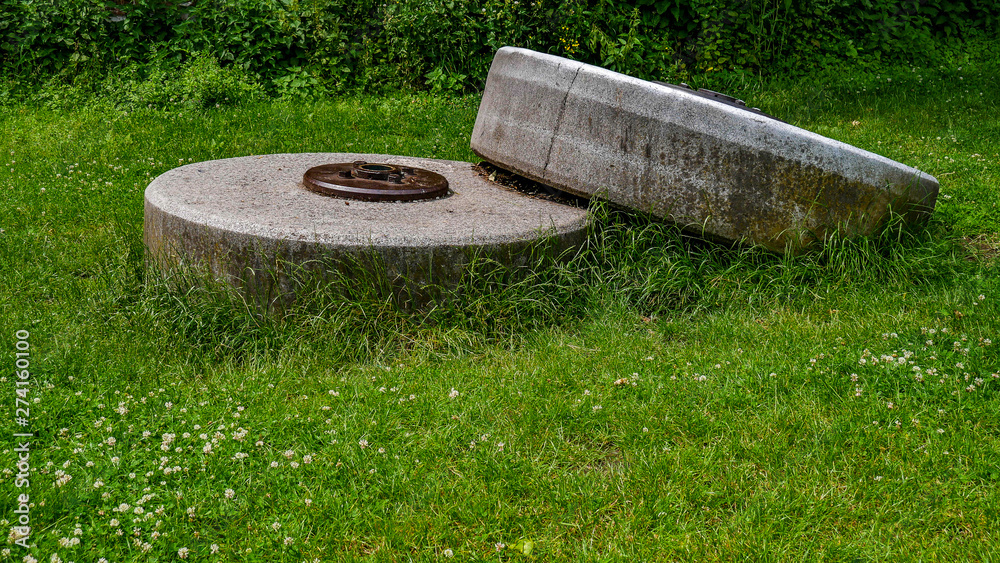 Fototapeta premium round stone in the ground 