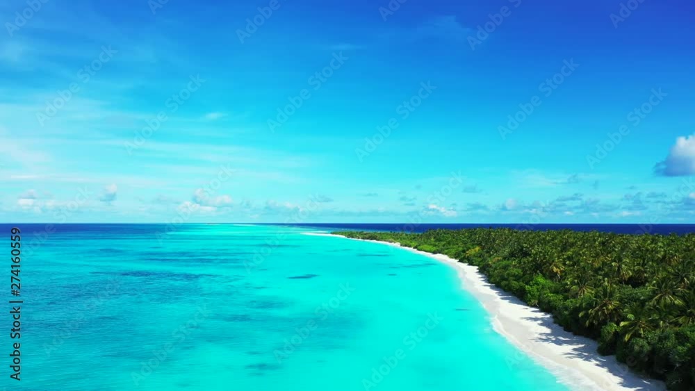 Looking over Forestry Isolated Island in Maldives, Camera is moving backwards Looking over Forestry Isolated Island in Maldives, Camera is moving backwards