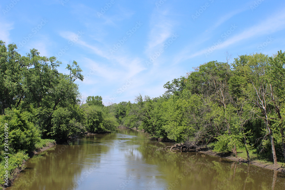 Cirrus clouds over the Des Plaines River at Campground Road Woods