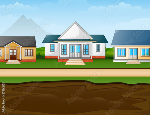 A muddy puddle in front the suburban houses