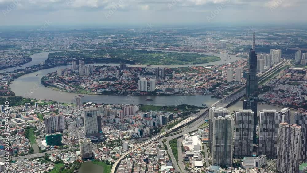 Aerial view of Downtown district of Ho Chi Minh City, aka Saigon, on sunset , including architectural landmark during daytime, South Vietnam Aerial view of Downtown district of Ho Chi Minh City, aka Saigon, on sunset , including architectural landmark during daytime, South Vietnam