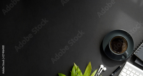 Fotografie Office leather desk table with coffee and office supplies