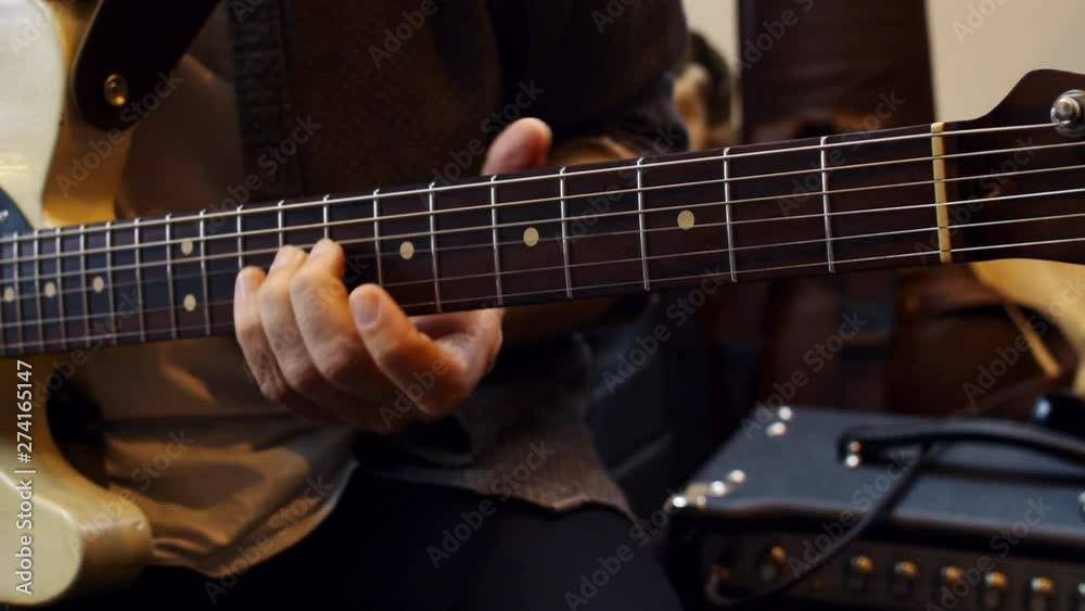 Musician playing guitar close up in 4k Musician playing guitar close up in 4k