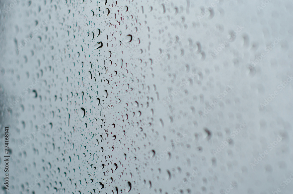 raindrops on glass in blur raindrops on glass in blur