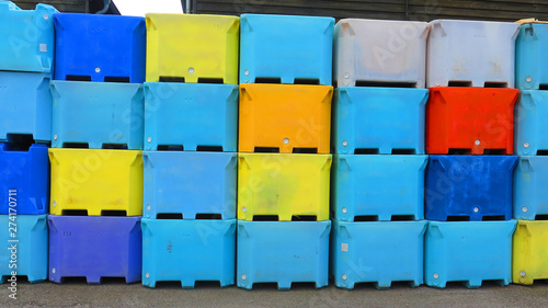 Blue  red and yellow plastic containers