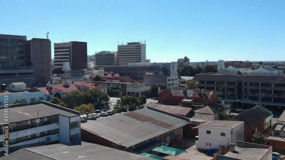 A push up shot of Bulawayo, Zimbabwe's city buildings under sunny conditions. A push up shot of Bulawayo, Zimbabwe's city buildings under sunny conditions.