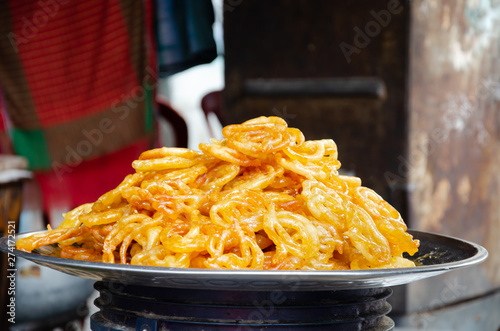 Stock photo of Jalebi or Jilbi or imarati, indian sweet food fried in pure ghee, selective focus photo