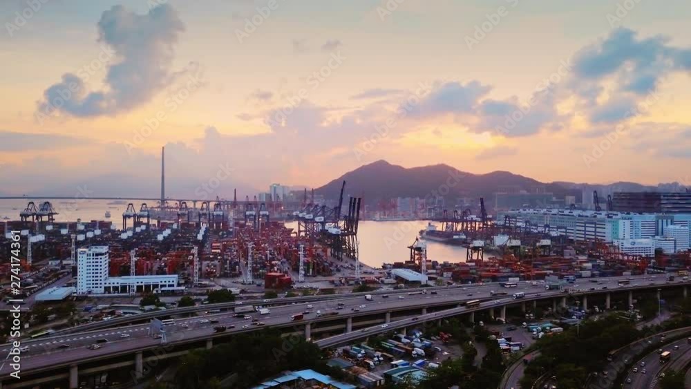 Aerial Sunset View of Hong Kong Kwai Chung Container Terminal, Highway 3, Highway 5, and Stonecutters Bridge Aerial Sunset View of Hong Kong Kwai Chung Container Terminal, Highway 3, Highway 5, and Stonecutters Bridge