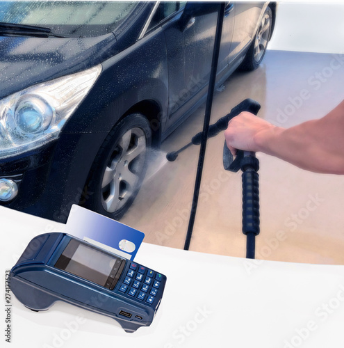 Car wash payment card. Modern payment blue terminal and card All silhouettes of cars are distorted for unrecognizability. photo