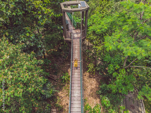 Canvas Print Young woman tourist at capilano suspension bridge kuala lumpur forest eco-park a
