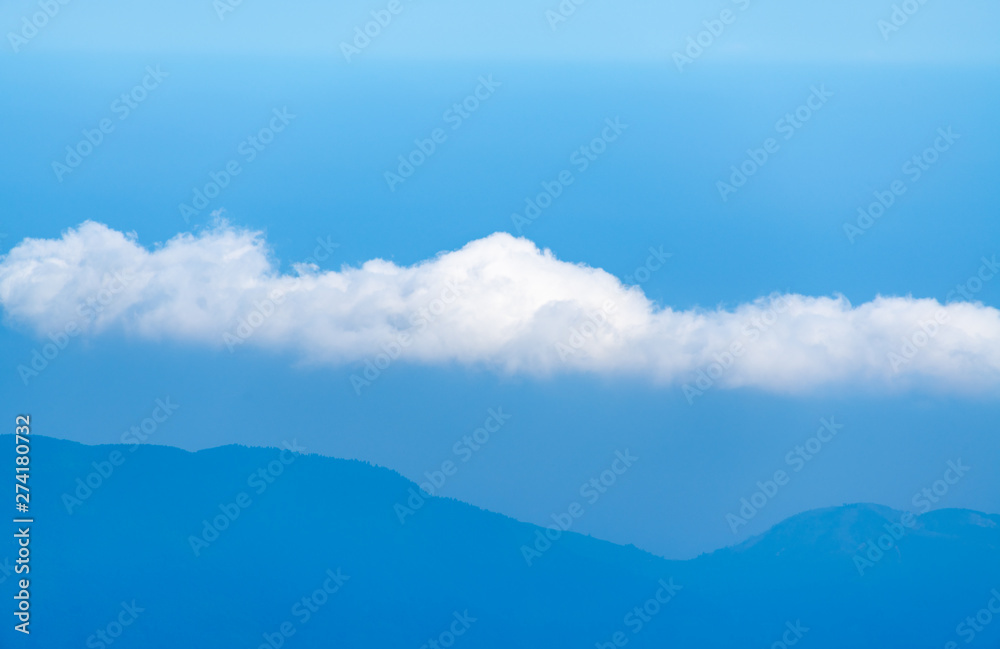 Peaks and seas of clouds under blue sky and white clouds, Emei Mountain, Sichuan Province, China