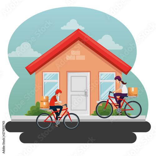 woman and man in the bicycle with boxes packages and house