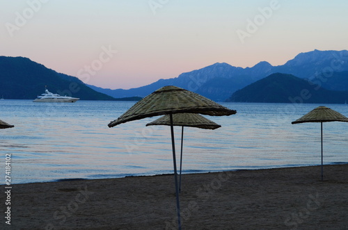 Fototapeta Naklejka Na Ścianę i Meble -  View of the evening beach of Marmaris in Turkey