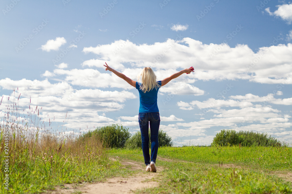 happy woomen jumping in the field happy woomen jumping in the field