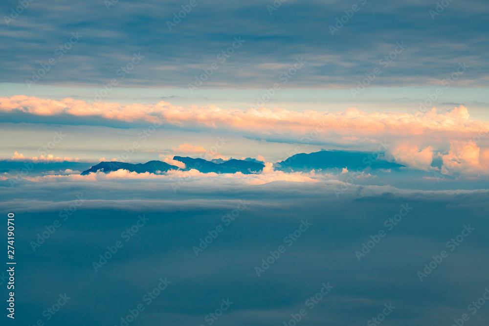 Mountains and seas of clouds at dusk, Emei Mountain, Sichuan Province, China Mountains and seas of clouds at dusk, Emei Mountain, Sichuan Province, China