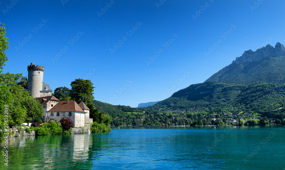 medieval castle on Annecy lake in Alpes mountains, France medieval castle on Annecy lake in Alpes mountains, France