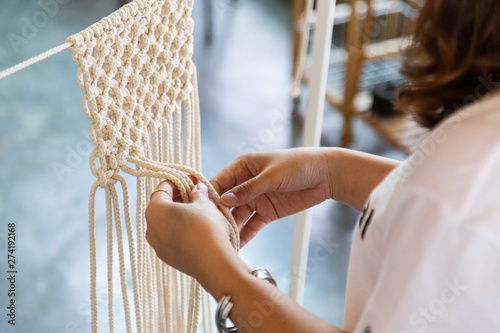 Women Hobby knitting handmade macrame. photo
