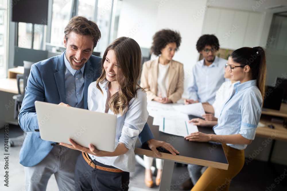 Business colleagues having meeting in conference room in office