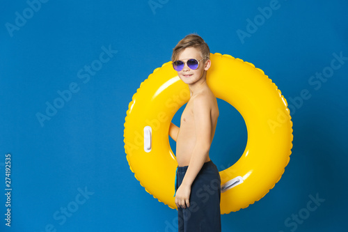 Cute little boy with inflat...